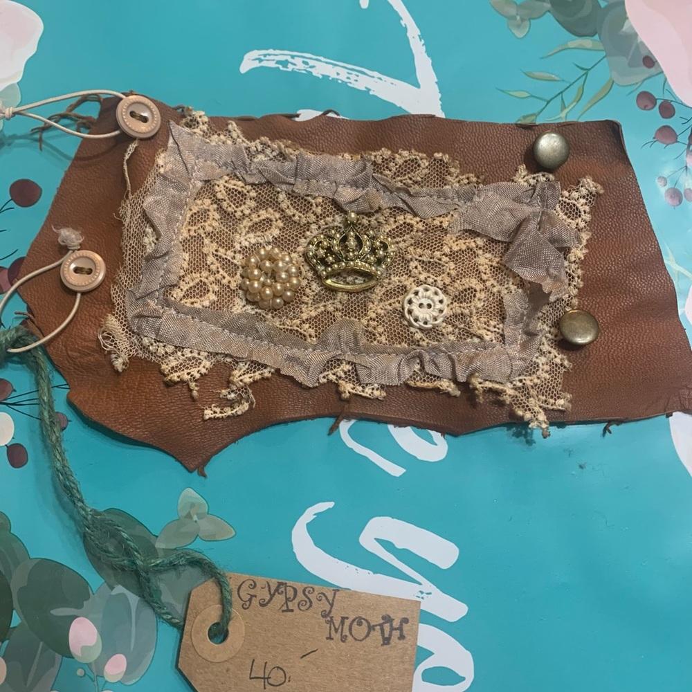 Distressed leather and vintage lace wrap cuff bracelet.